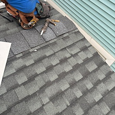 Fixing-A-Leak-By-Installing-A-New-Asphalt-Roofing-System 1